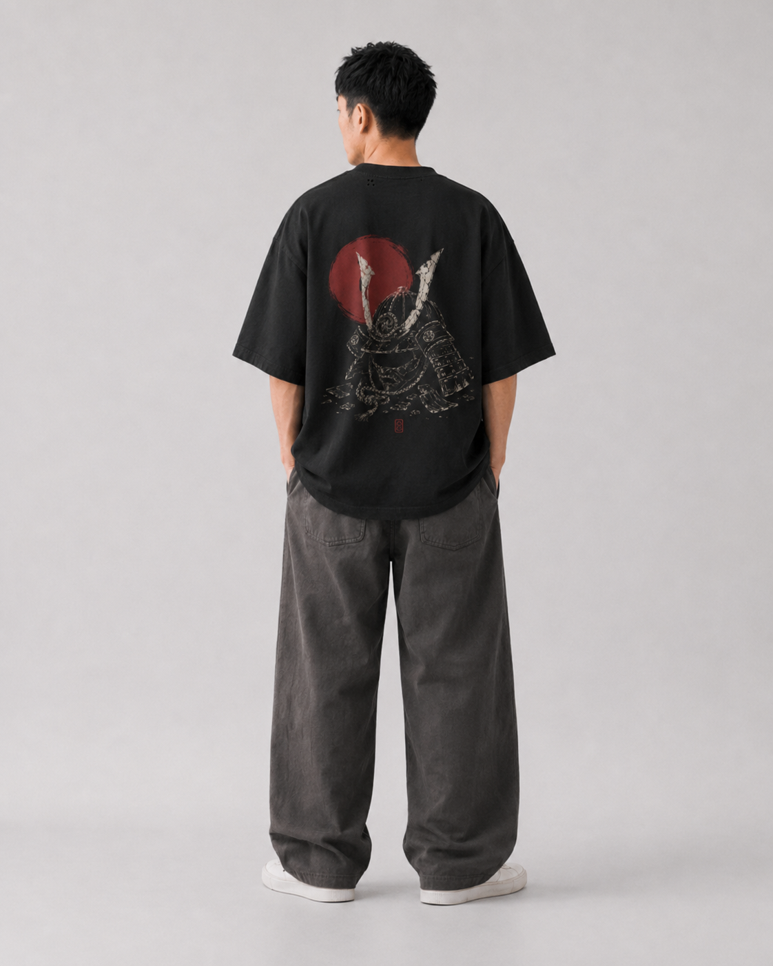 Model wearing the KUROGANE Fallen Kabuto heavyweight oversized samurai T-shirt