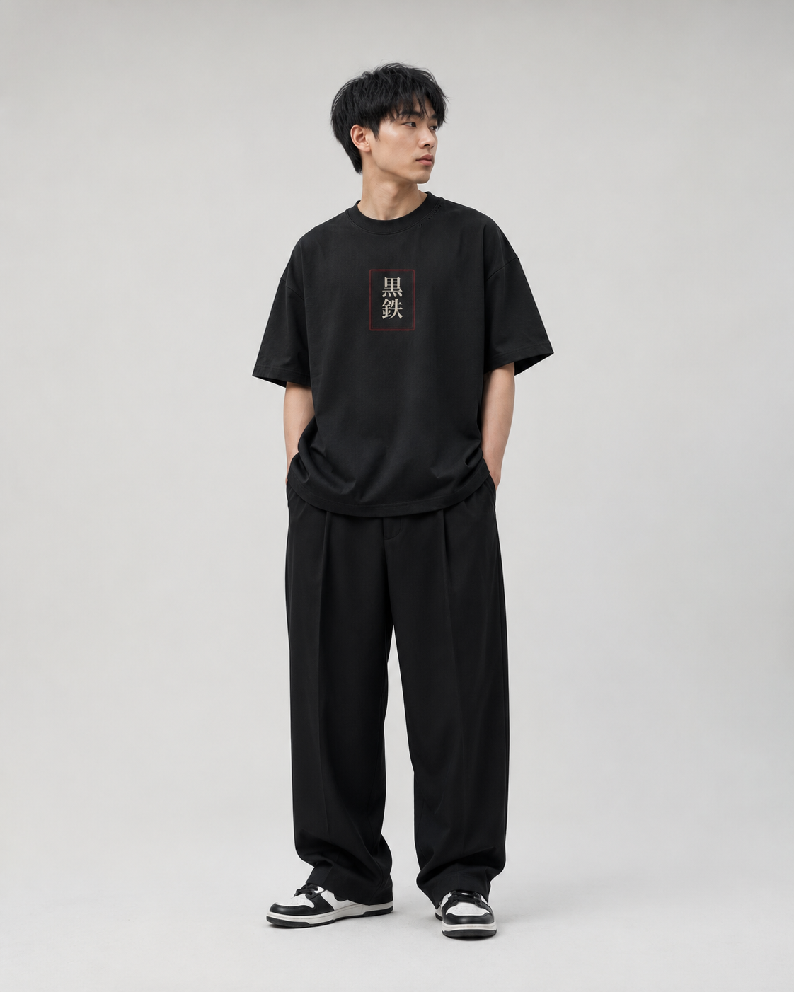 Model wearing the KUROGANE Hidden Village heavyweight oversized Japanese landscape T-shirt
