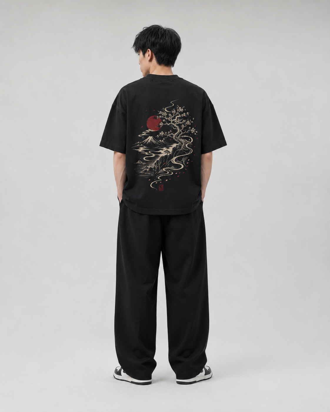 KUROGANE Hidden Village oversized Japanese streetwear T-shirt shown on a model