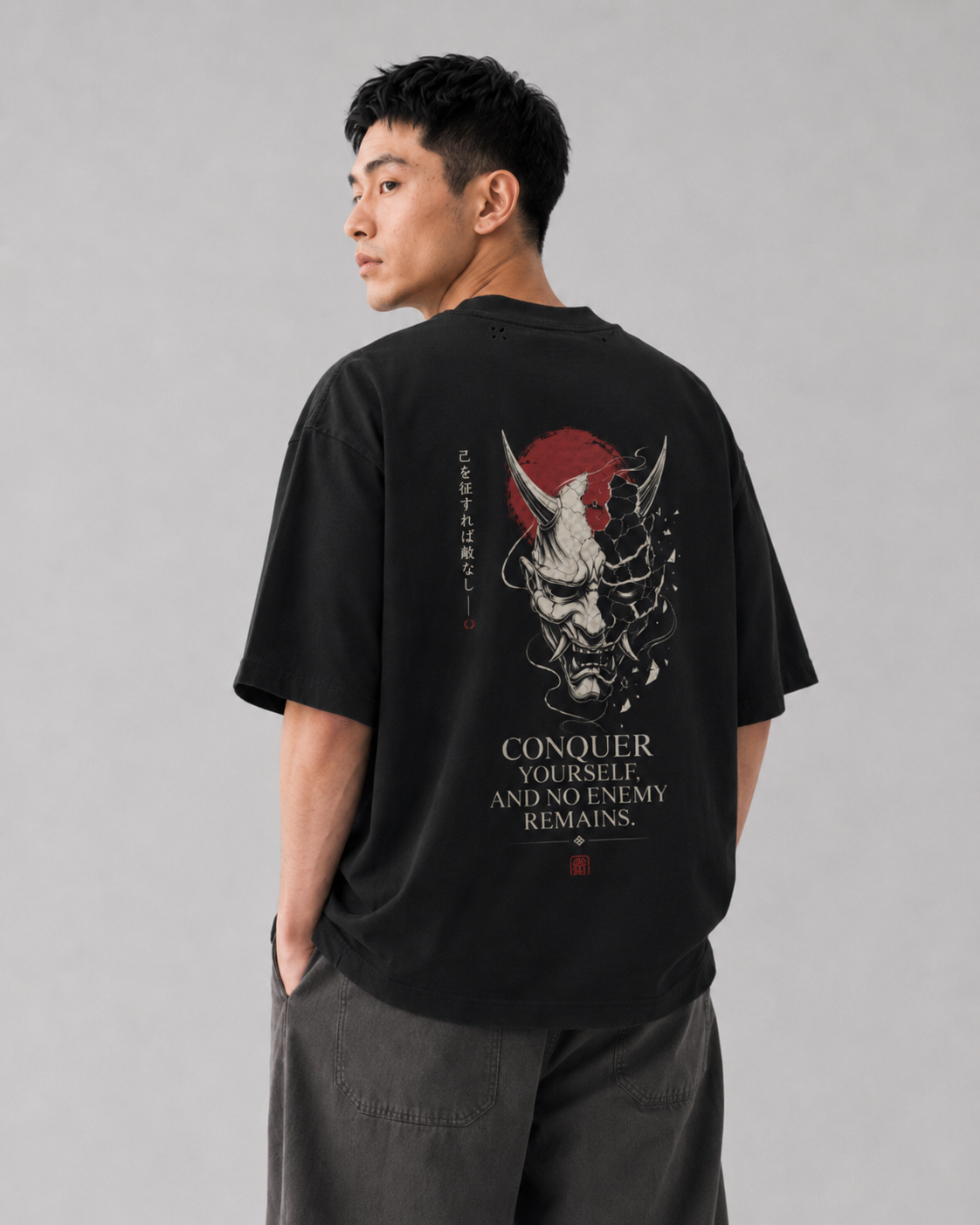 Model wearing the KUROGANE Inner Conquest heavyweight oversized fractured oni T-shirt