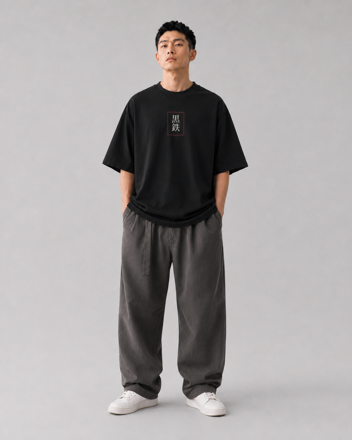 KUROGANE Inner Conquest oversized Japanese oni streetwear T-shirt shown on a model