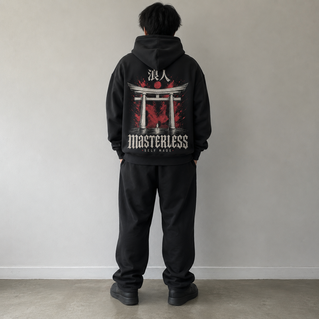 Black KUROGANE oversized hoodie with MASTERLESS Gate graphic