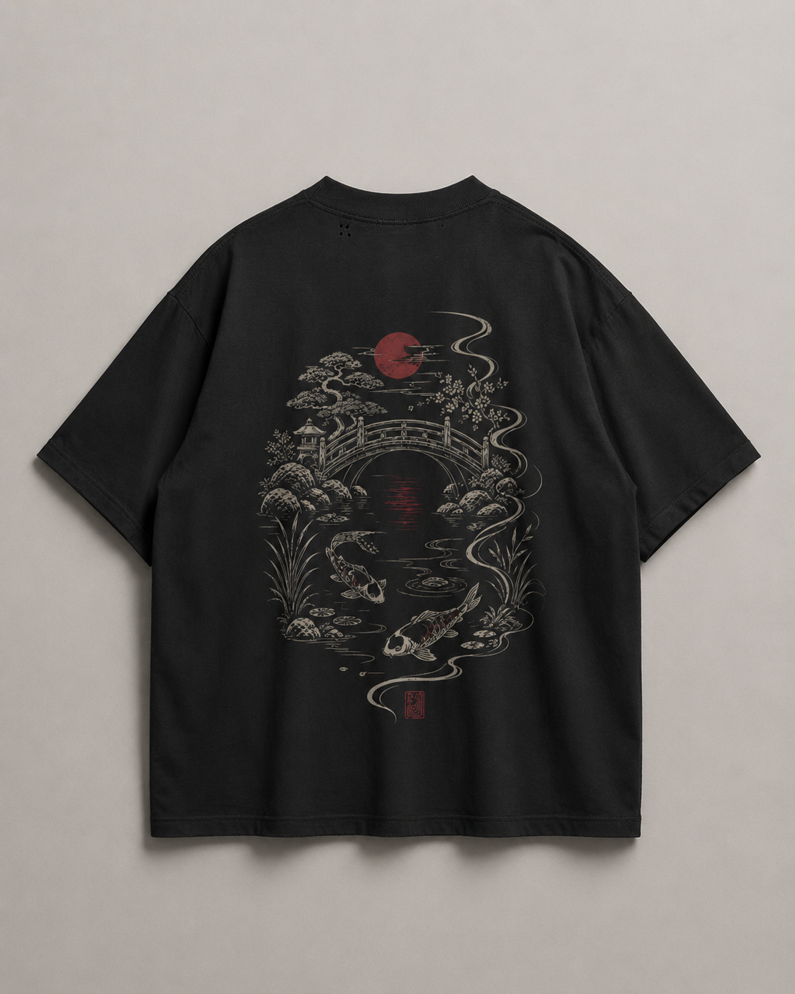 Model wearing the KUROGANE Moonlit Crossing heavyweight oversized koi pond T-shirt