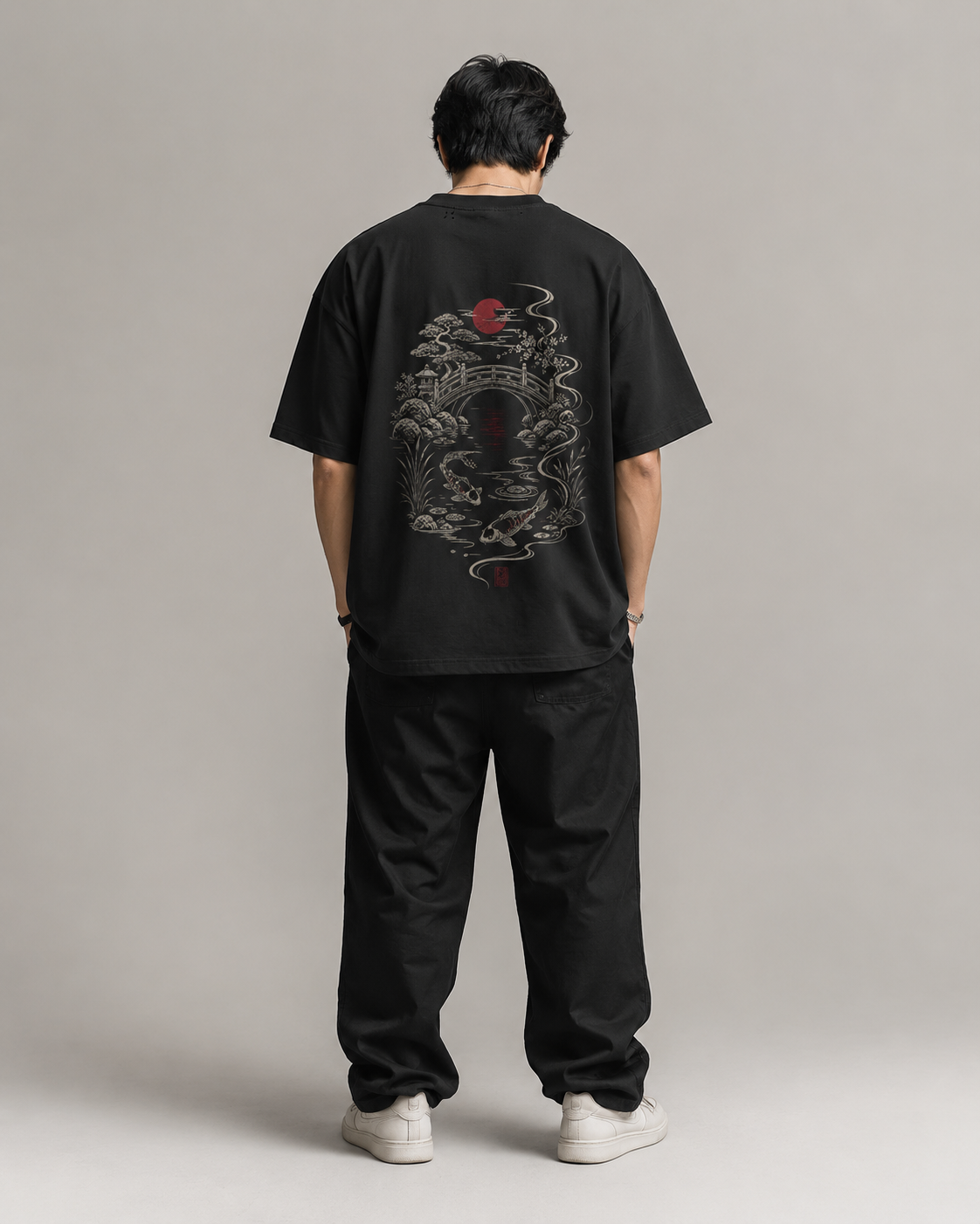 Model fit view of the KUROGANE Moonlit Crossing Japanese koi bridge graphic T-shirt