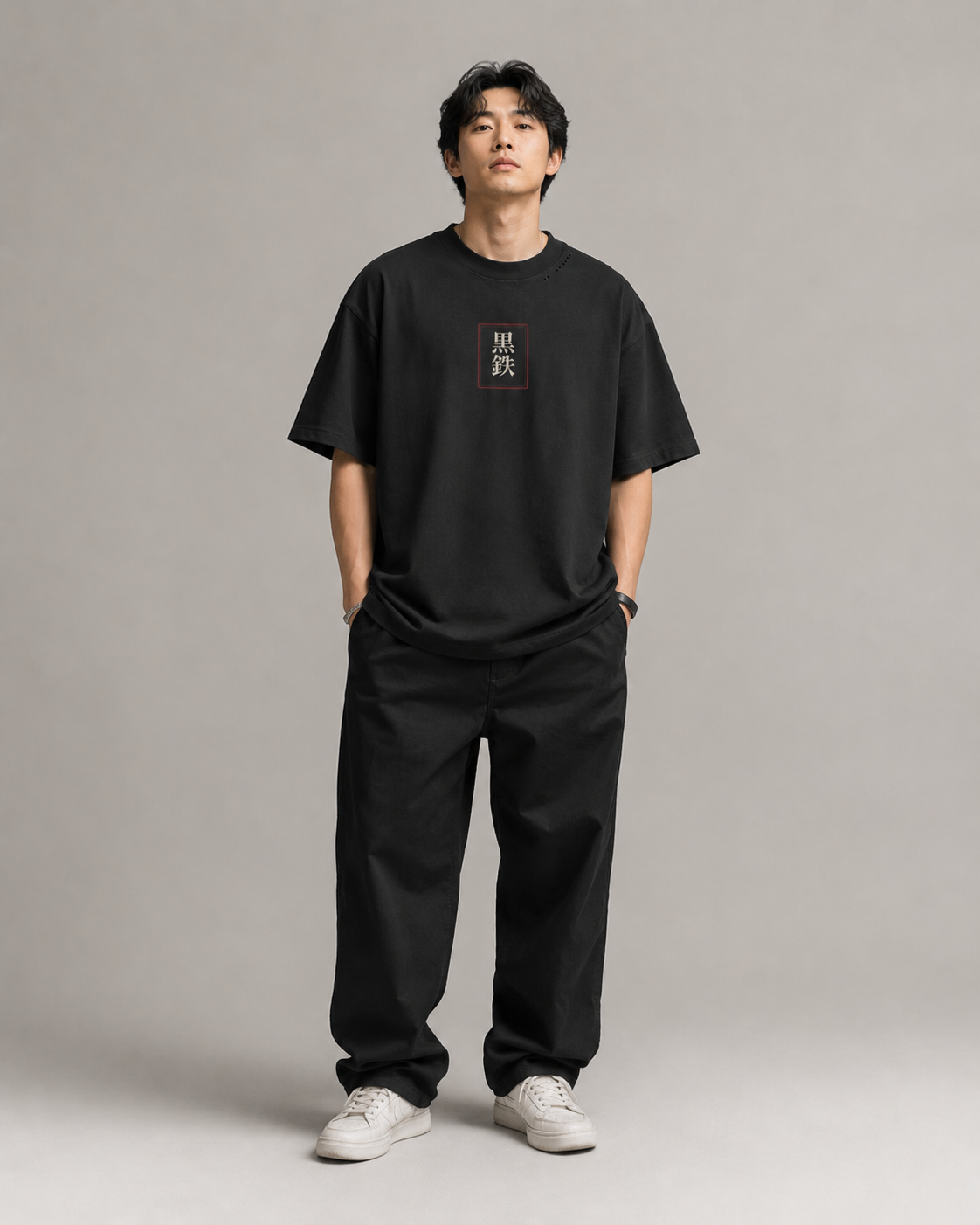 Model wearing the KUROGANE Moonlit Crossing oversized Japanese koi pond streetwear tee