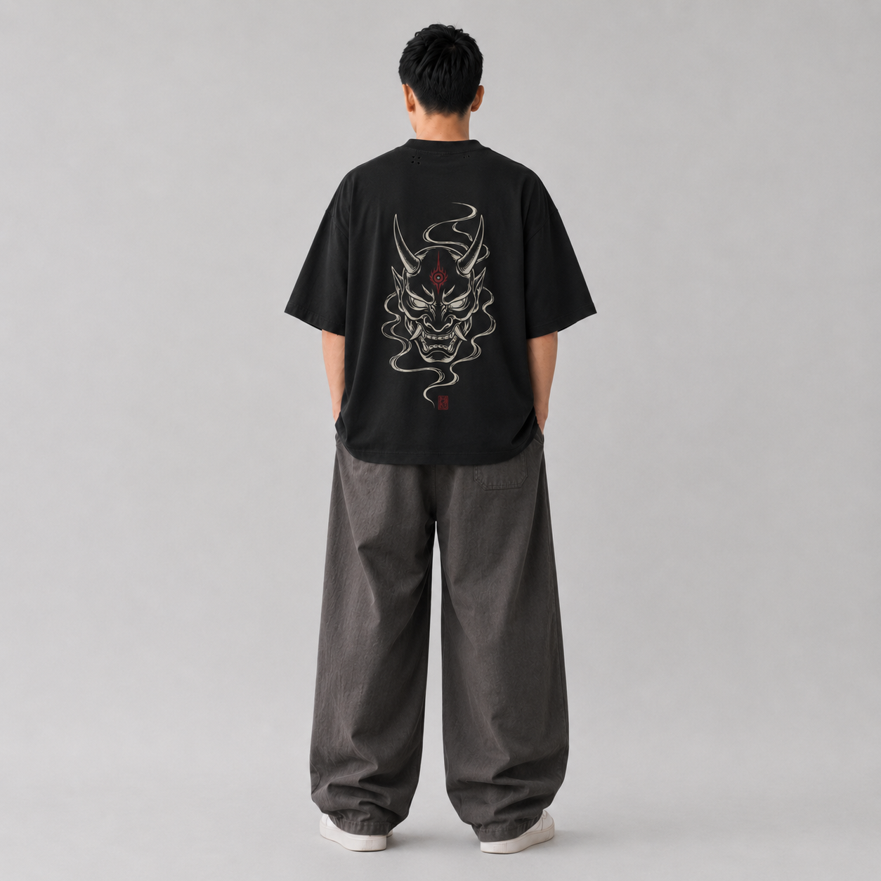Product mockup of the KUROGANE Oni Veil Japanese oni graphic T-shirt