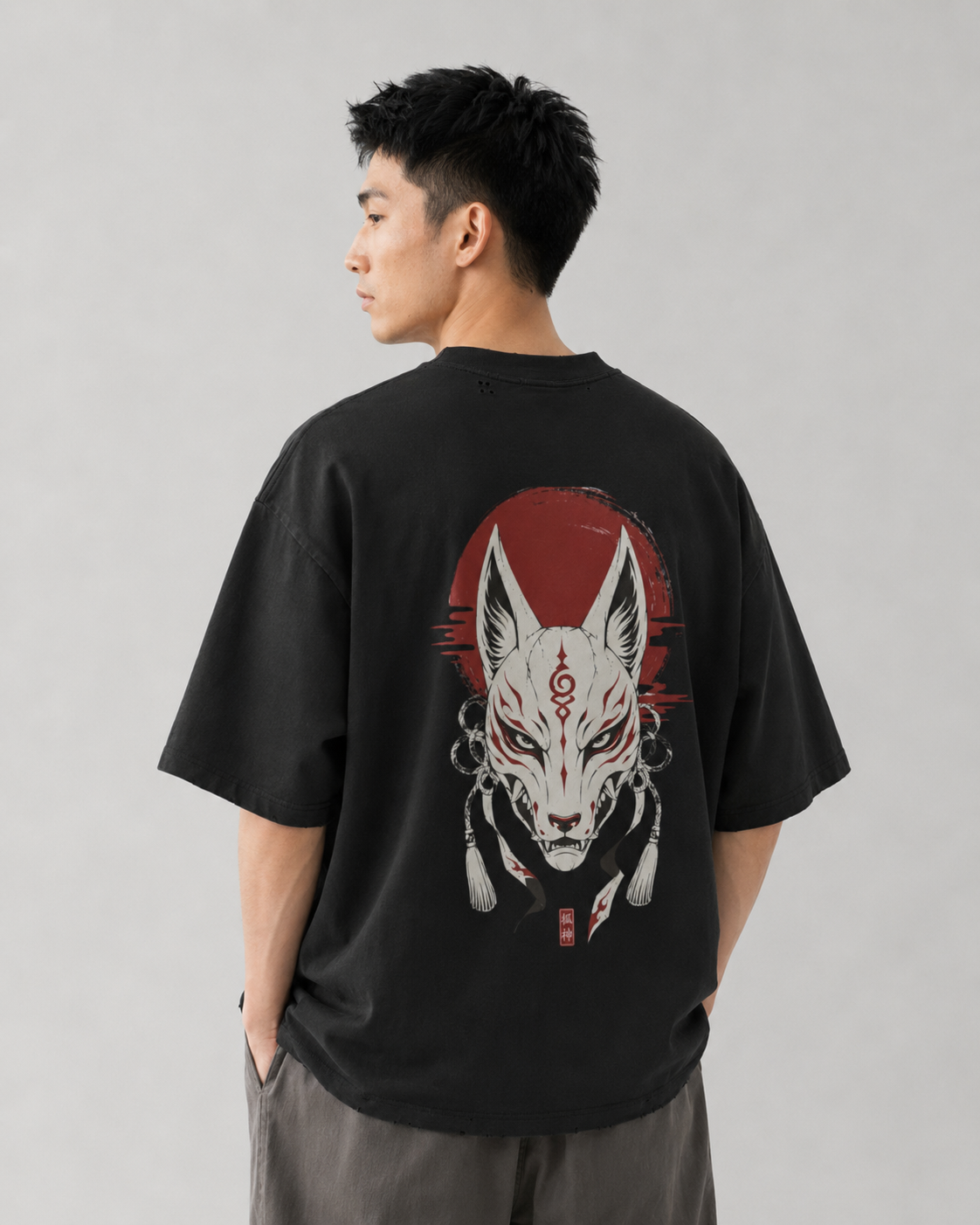 Model wearing the KUROGANE Shattered Oni heavyweight oversized Japanese mask T-shirt