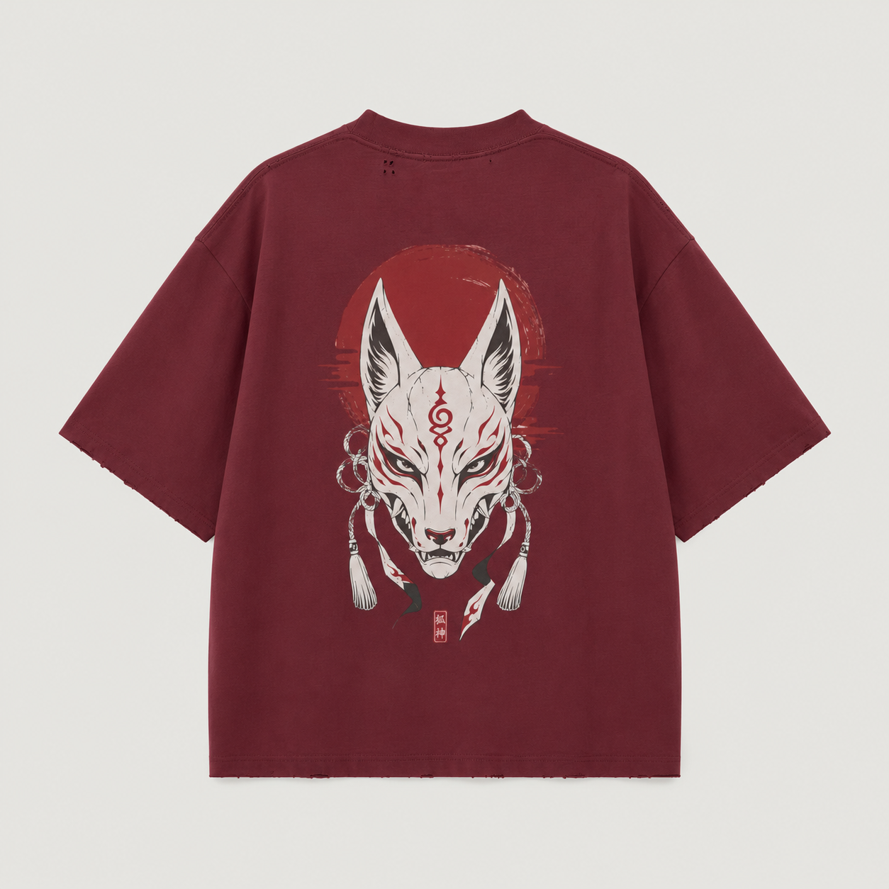 Product mockup of the KUROGANE Shattered Oni fractured mask graphic T-shirt