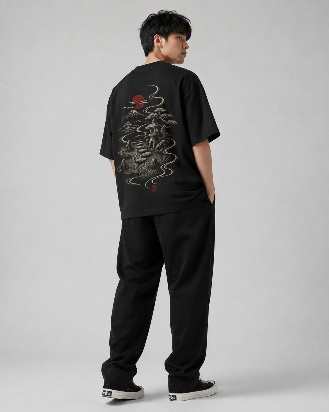 Model fit view of the KUROGANE Stillwater Hamlet oversized Japanese graphic T-shirt